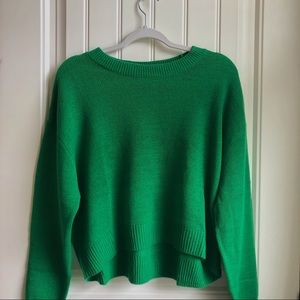 green sweater